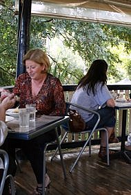 Regals' Rendezvous - lady at table