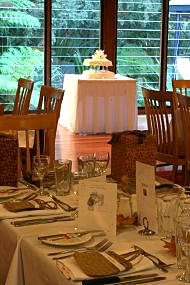 Regals' Rendezvous - wedding cake garden background