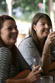 Ice Cube Seafood Grill Bar - two ladies wine glasses