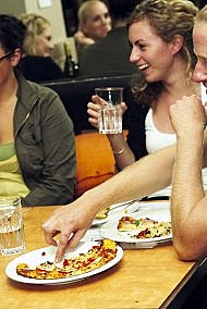 Pizza Place - at table girl smiling 3